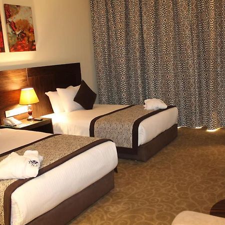 Tolip El Forsan Hotel Исмаилия Экстерьер фото A room at the hotel