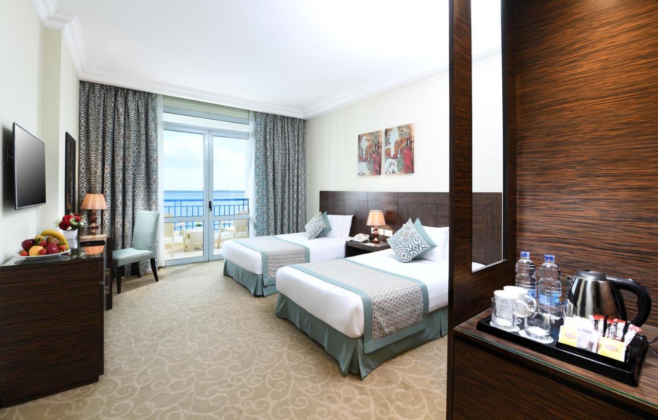 Tolip El Forsan Hotel Исмаилия Экстерьер фото A room at the hotel