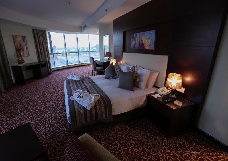 Tolip El Forsan Hotel Исмаилия Экстерьер фото A bedroom at the hotel