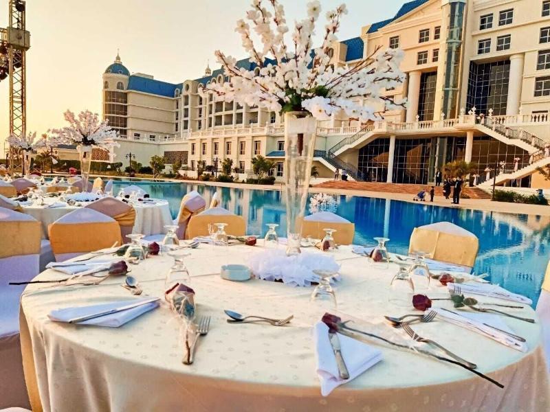 Tolip El Forsan Hotel Исмаилия Экстерьер фото Wedding reception at the poolside